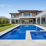 Modern Perth backyard with a Manhattan fibreglass pool, integrated spa and alfresco area ready for summer